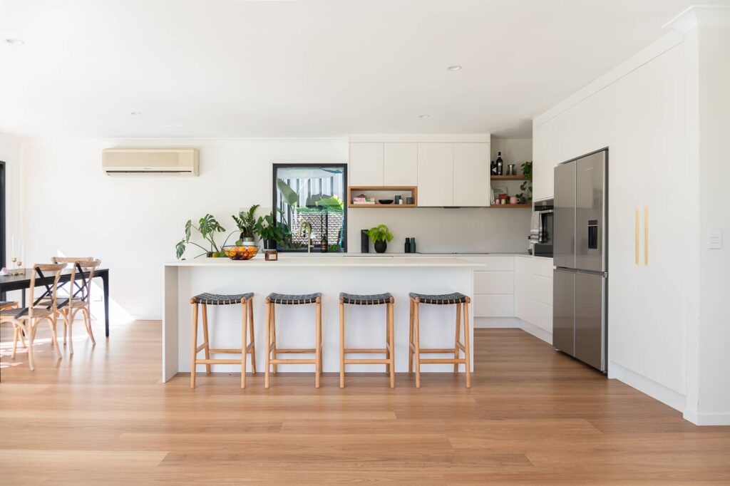 A modern Australian kitchen area displaying clean hybrid flooring.