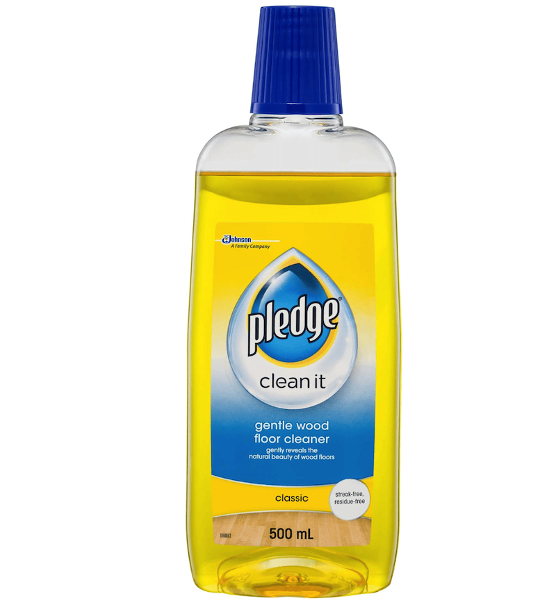 Pledge Gentle Wood Floor Cleaner bottle, designed for removing dirt and revealing the natural shine of wood floors. Provides streak-free, residue-free cleaning with a fresh scent, suitable for home and office use.